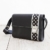Lederhandtasche mit Polka Dots, süße Umhängetasche aus schwarzem Rindsleder , femininer Crossbodybag -