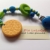 Spielkette Beißkette aus Silikon mit Keks in blau grün – Kinderwagenkette - 